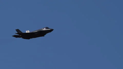 Modern Supersonic Multirole Fighter Jet Flying at High Speed in Clear Sky Stock Footage 296060455