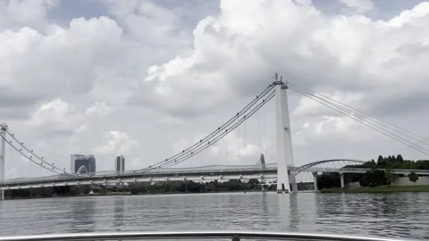 Modern suspension bridge spans calm waters Stock Footage 340034331