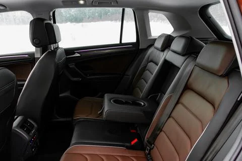 Modern SUV car inside. Leather black back passenger seats in modern luxury ca Stock Photos