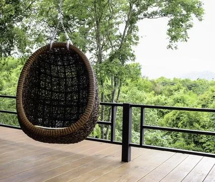 Modern swing in the garden Stock Photos