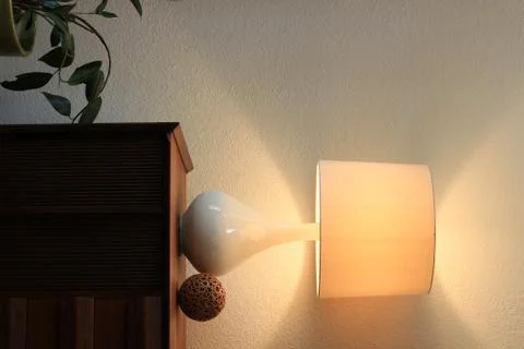 Modern table and lamp. Stock Photos
