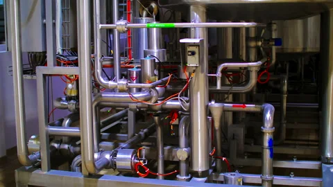 Modern technological industrial construct of pipelines and storage tanks. Stock Footage 150517440