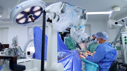 Modern technological microscope on the stand arranged over the operating table.  Stock Footage 307429853