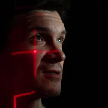 Modern technologies and human. young man with projection of red lines Foto stock