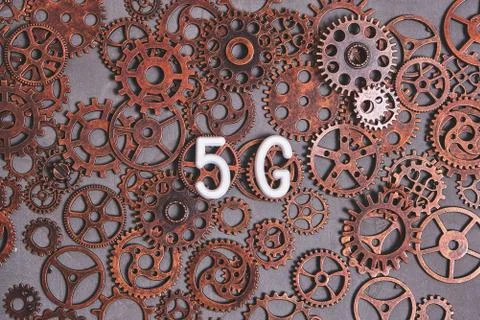 Modern technologies and progress. Logo 5G background of gears. Stock Photos