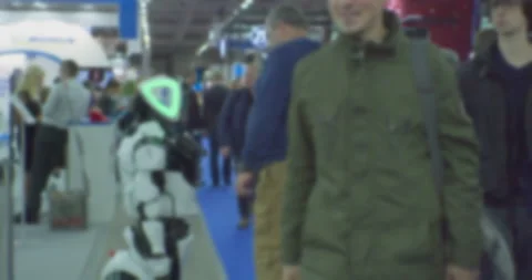 Modern technologies in everyday life.man communicate with a robot on the screen Stock Footage 161599372