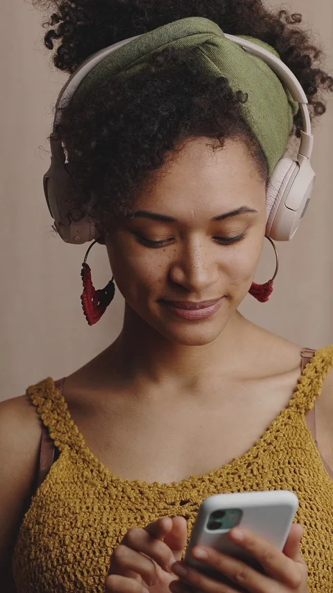 Modern technologies. Portrait of young stylish african american lady wearing Stock Footage 328608632