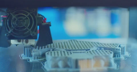 Modern technologies.3D printer prints a complex plastic part.close-up.shallow Stock Footage 169512776