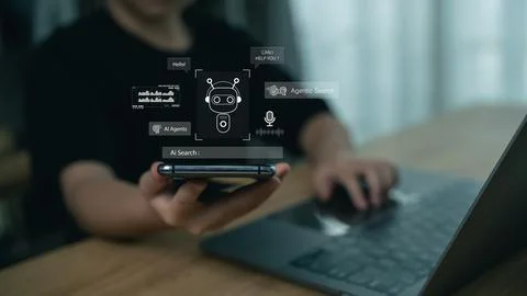 Modern technology concept featuring a person using a smartphone with hologr.. Stock Photos