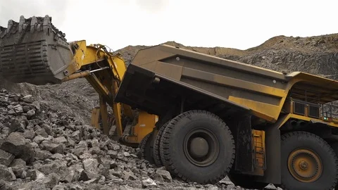 Modern technology is digging on rocky soil Stock Footage 104851708