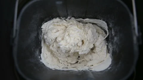 Modern technology in the kitchen. The bread maker kneads the dough. accelerated Stock Footage 90860793