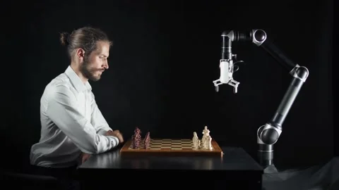 Modern technology, man playing chess with a robot, the confrontation between man Stock Footage 133217383