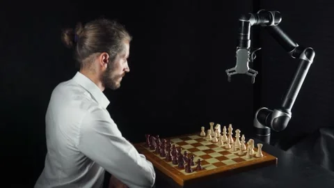 Modern technology, man playing chess with a robot, the confrontation between man Stock Footage 133217694