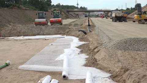 Modern technology materials and equipment used in new highway road construction Stock Footage 107347562