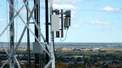 Modern Telecommunications Infrastructure and Cellular Mobile Data Network Tower Stock Photos