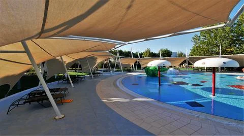 Modern tents at the pool side Stock Photos