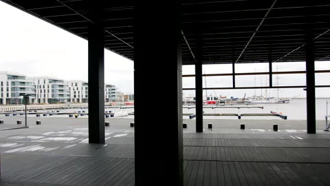 Modern terrace overlooking the marina on a cloudy day, dolly shot Stock-Footage 150957258