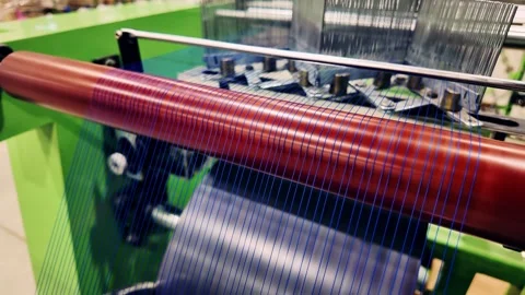 The Modern Textile Manufacturing Process in Action A Blend of Artistry and Stock Footage 323611320