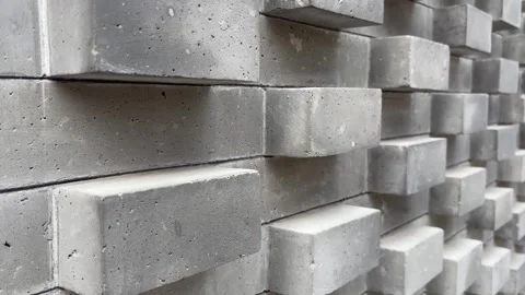 Modern textured Grey Brick Wall Slow Diagonal Pan Right Stock Footage 332259851