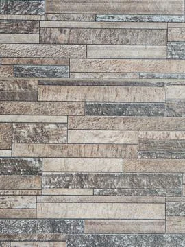Modern textured stone tile wall background Stock-Fotos