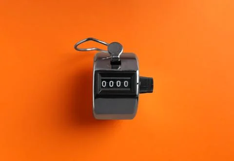 Modern timer on orange background, top view Stock-Fotos