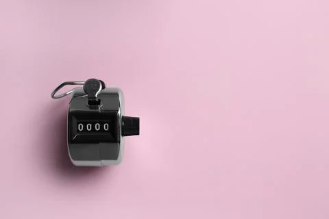 Modern timer on pink background, top view. Space for text Stock Photos