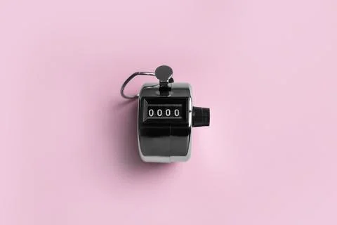 Modern timer on pink background, top view Stock Photos