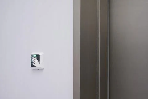 Modern touchless automatic door openers and door details Stock Photos