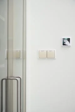 Modern touchless automatic door openers and door details Stock Photos