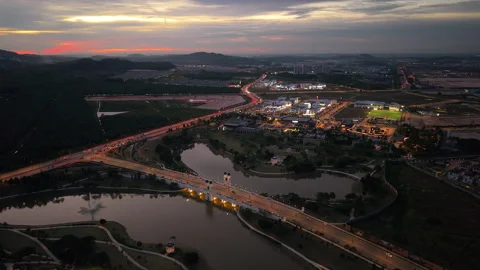 Modern Township with Solar Panel Rooftops and Lakefront Park in Malaysia Stock Footage 315460377