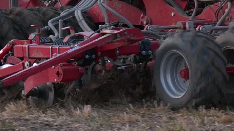 Modern tractor in the field during planting Stock Footage 290065545