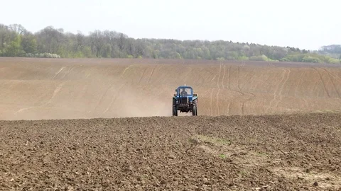 Modern tractor in the field Video stock 87608335