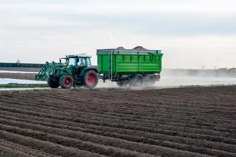 Modern tractor with trailer Stock Photos