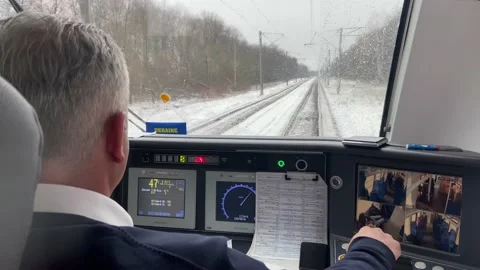 Modern train driver's cabin during movement by rail. Winter. Stock Footage 239903194