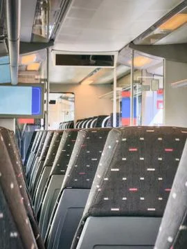 Modern Train Interior with Empty Passenger Seats Stock Photos