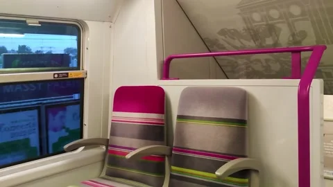 Modern Train in Motion with Colored Seats in Paris, France.  動画素材 232673792
