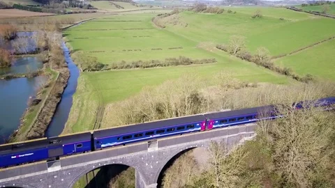 Modern train over a viaduct 스톡 동영상 73235486