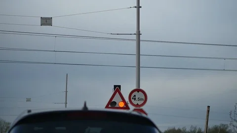 Modern train passing by while cars waiting Stock Footage 88828259