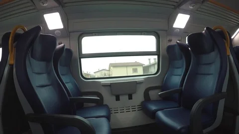 Modern train seats. Shooting inside the train in motion in 4K Stock Footage 74525489