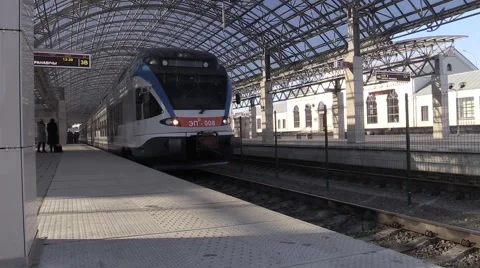 Modern train standing on the platform Video stock 59995646