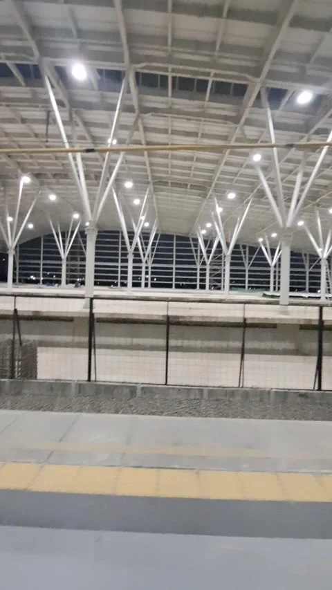 Modern Train Station Interior at Night Vídeo Stock 331416037