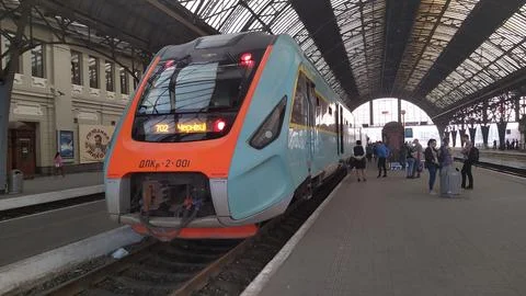 Modern train in the station Фото