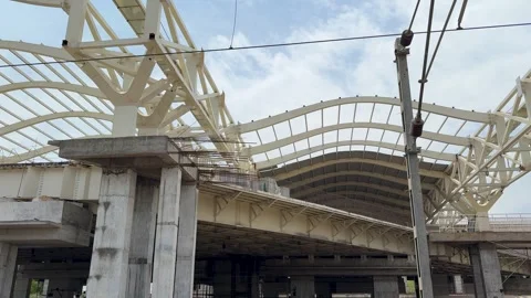 Modern train station under construction with concrete pillars Stock Footage 332766674