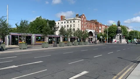 Modern tram and double decker buses. Irish Public transport. Dublin, Ireland Stock Footage 252431111