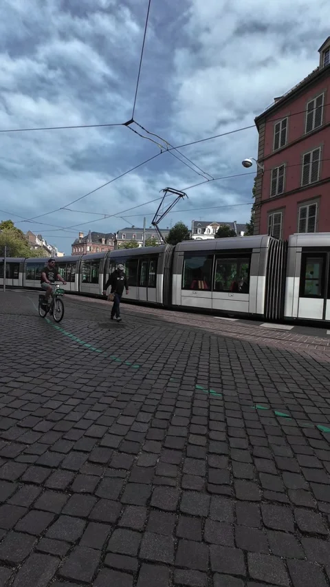 Modern Tram Moving Through the Streets of Strasbourg Stock Footage 344060433