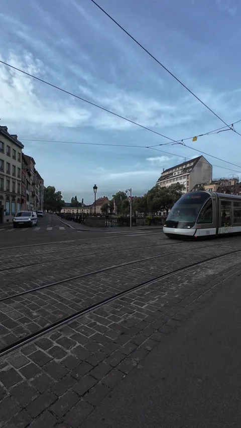 Modern Tram Moving Through the Streets of Strasbourg Stock Footage 344060538