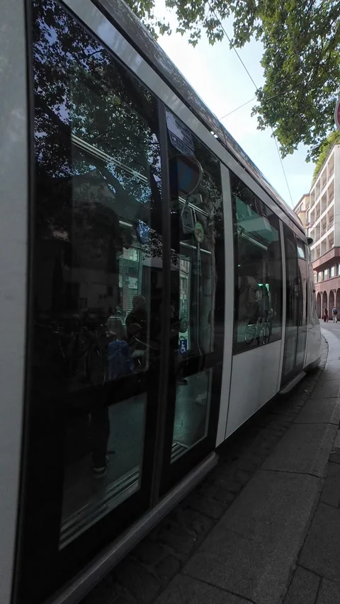 Modern Tram Moving Through the Streets of Strasbourg Stock Footage 344060577