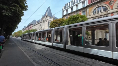 Modern Tram Moving Through the Streets of Strasbourg Stock Footage 344060665