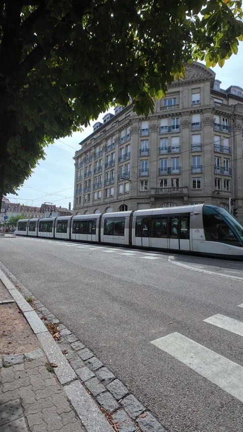 Modern Tram Moving Through the Streets of Strasbourg Stock Footage 344060668