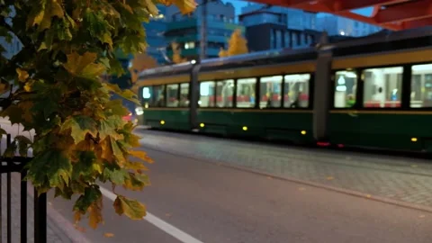 Modern Tram is moving under the bridge in Helsinki, Finland Stock Footage 163149863